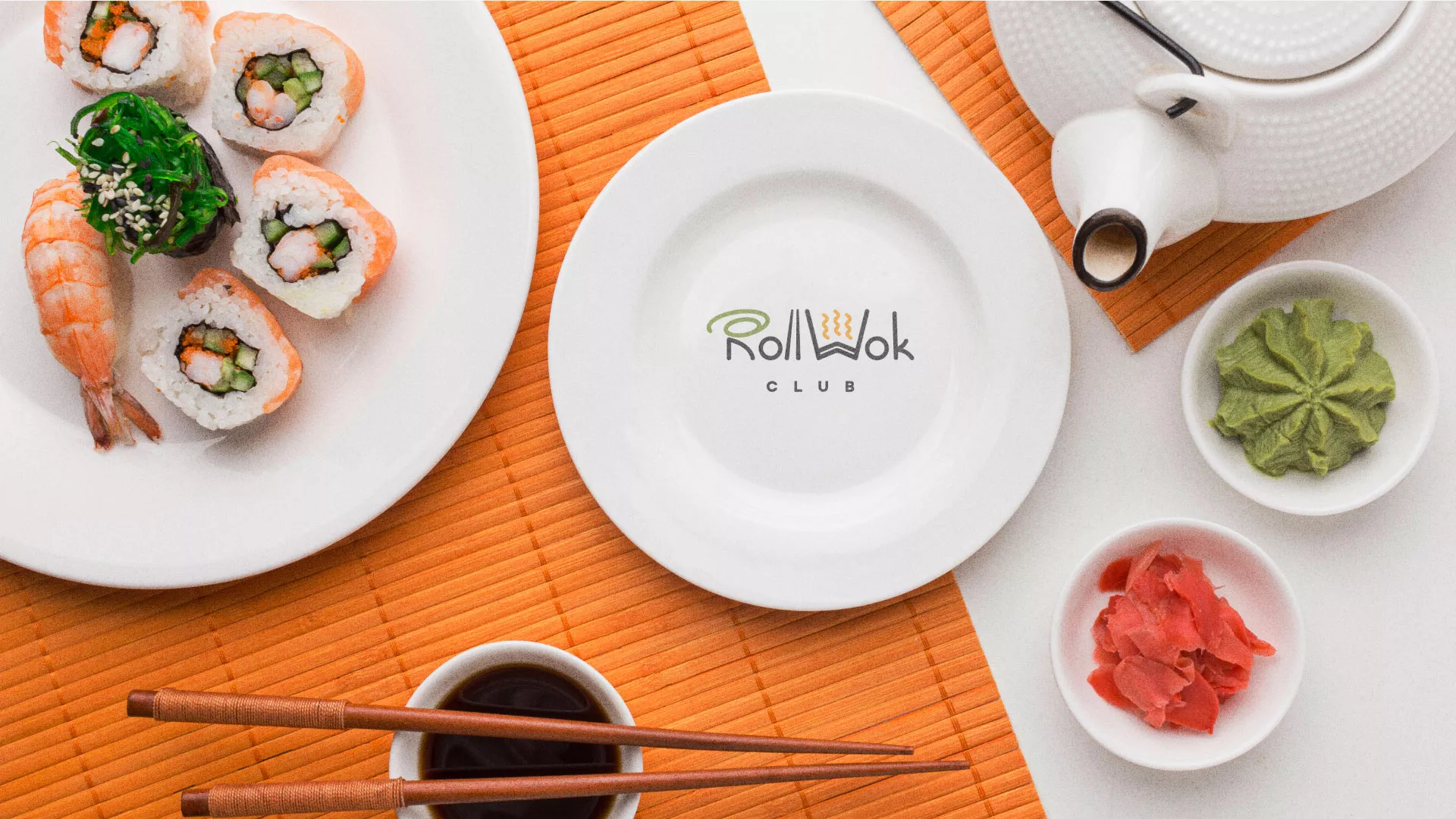 Разработка логотипа и фирменного стиля суши-бара «Roll Wok Club» в Южно-Сухокумске